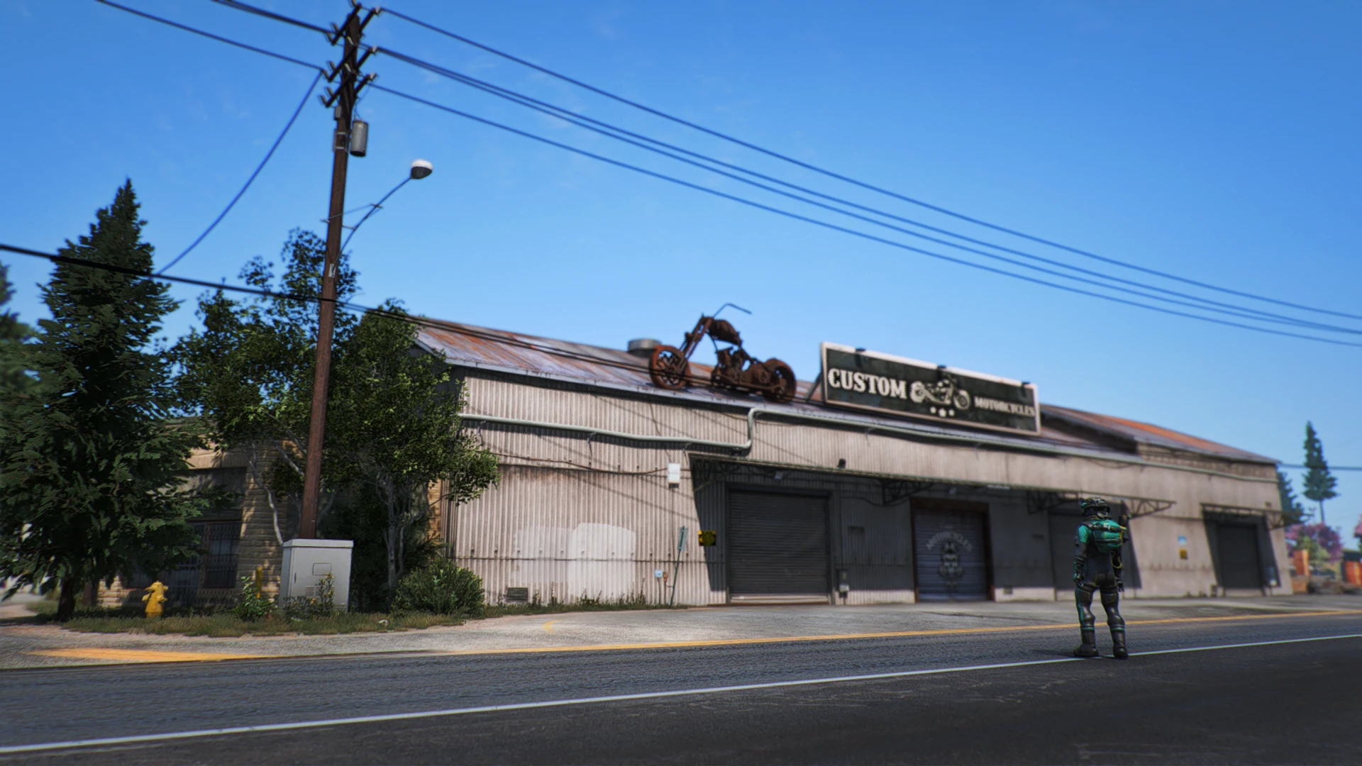 Biker mechanic shop garage in Paleto with lifts, tools, and a bar