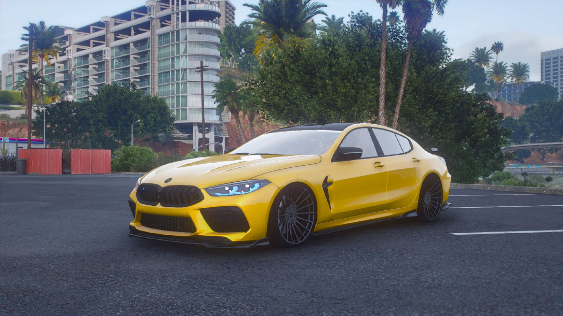 BMW M8 Competition grand tourer parked in a FiveM city plaza