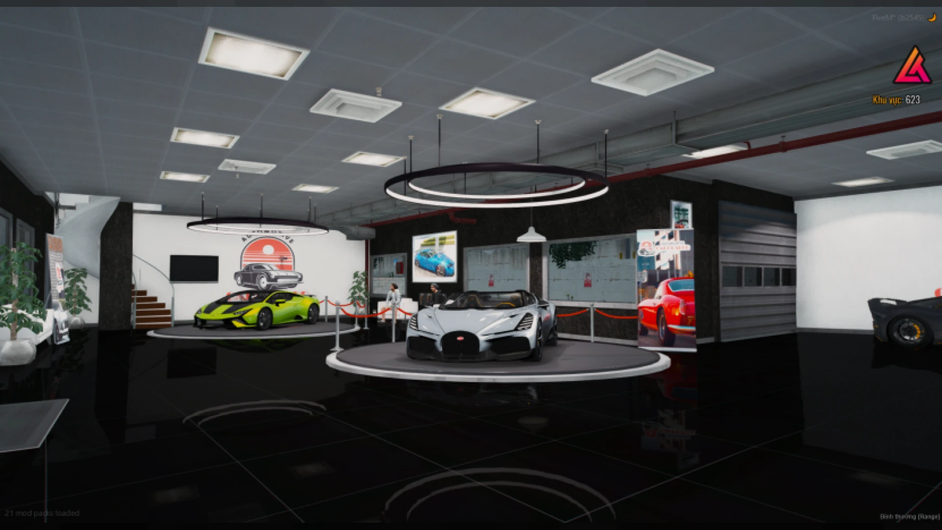 Car dealer mlo showroom floor with display bays and a reception desk — view 2