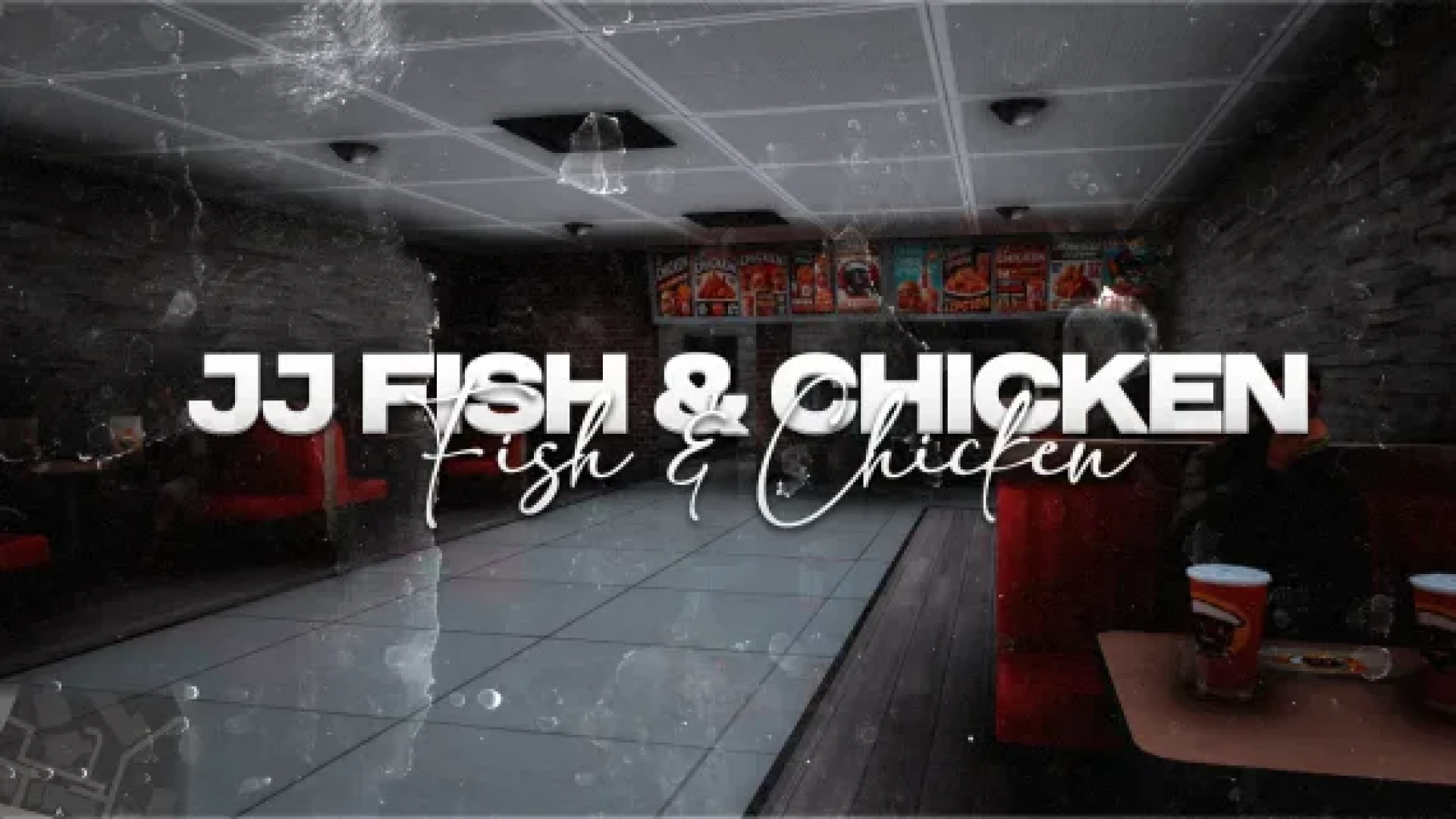 Fish and chicken store counter with menu boards and fryers