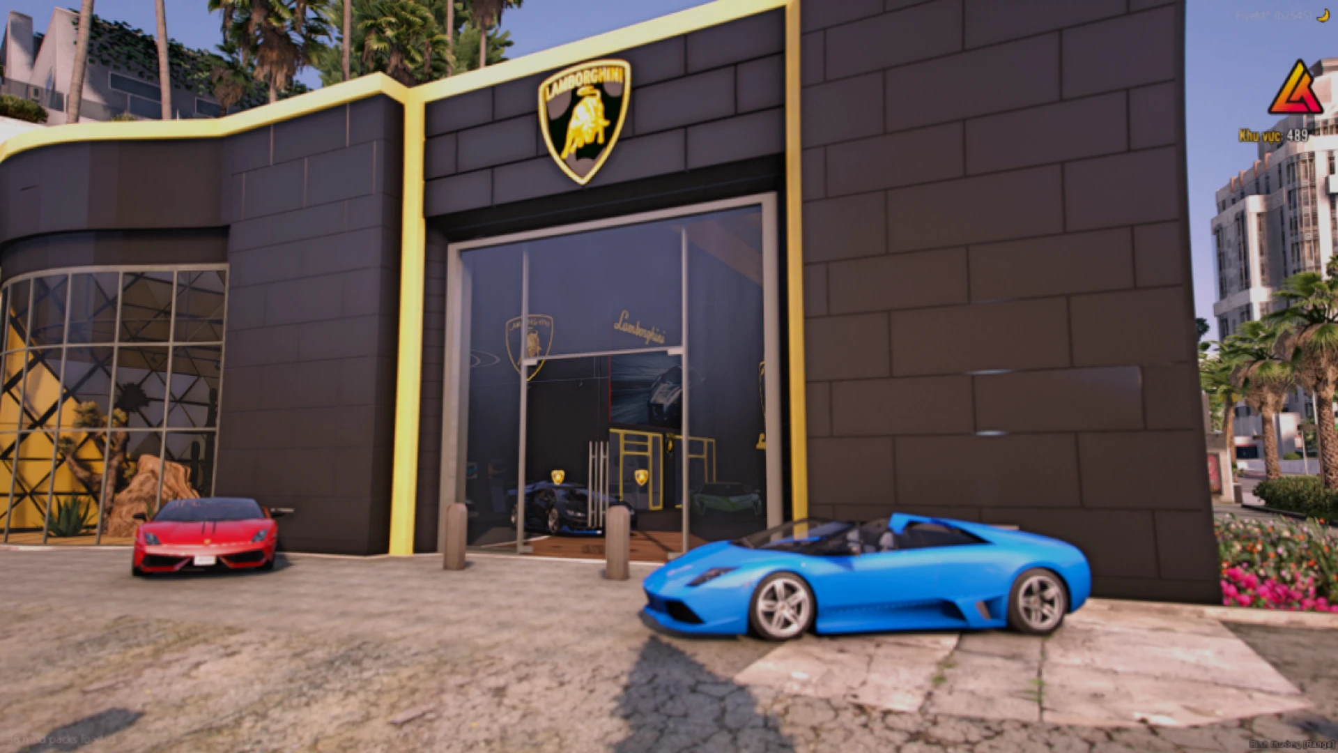 Lamborghini dealership mlo showroom floor with display cars and desks — view 2