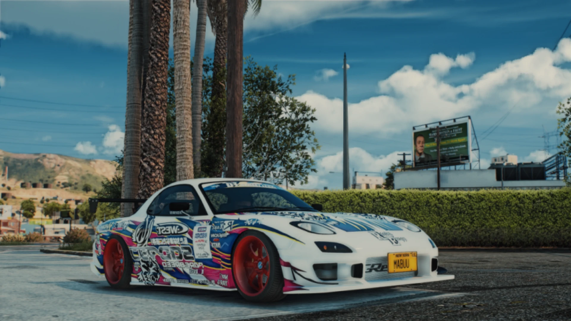Mazda RX7 C-West rotary drift car sliding through a corner