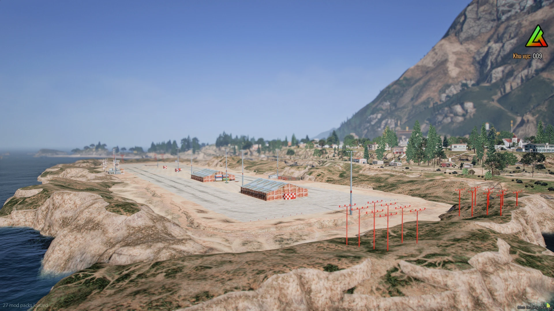 Paleto airport mlo with a terminal building and hangars beside the runway
