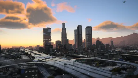 CoreFX graphics shading a cinematic sunset over a FiveM Los Santos skyline