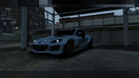 Mazda RX8 FiveM add-on drift car sliding through a city corner
